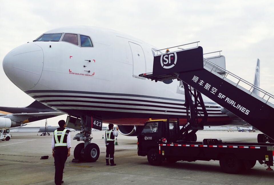 Domestic air freight + consolidated ocean shipping